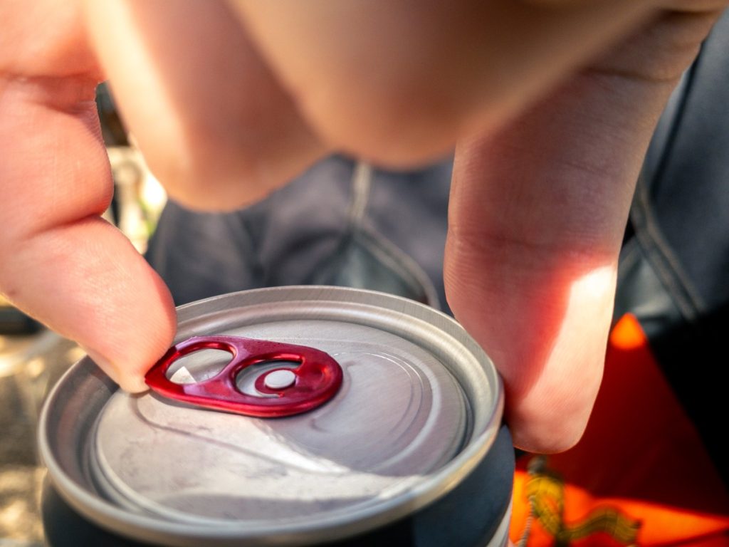 man take an energy drink